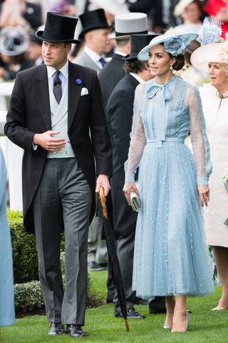 The Princess of Wales wears a pale blue blouse and skirt with matching fascinator at the Royal Ascot.
