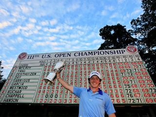BETHESDA, MD - JUNE 19: Rory McIlroy of Northern Ireland poses with the trophy after his eight-stroke victory on the 18th green during the 111th U.S. Open at Congressional Country Club on June 19, 2011 in Bethesda, Maryland. (Photo by David Cannon/Getty Images)