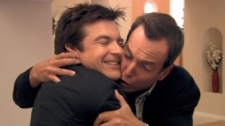 Jason Bateman's Michael Bluth "tastes the sad" on Gob's face on Arrested Development.