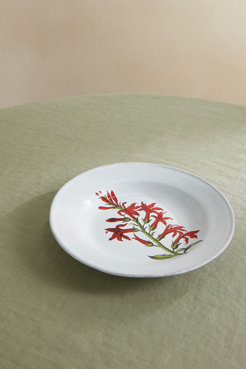 White soup plate with red floral design