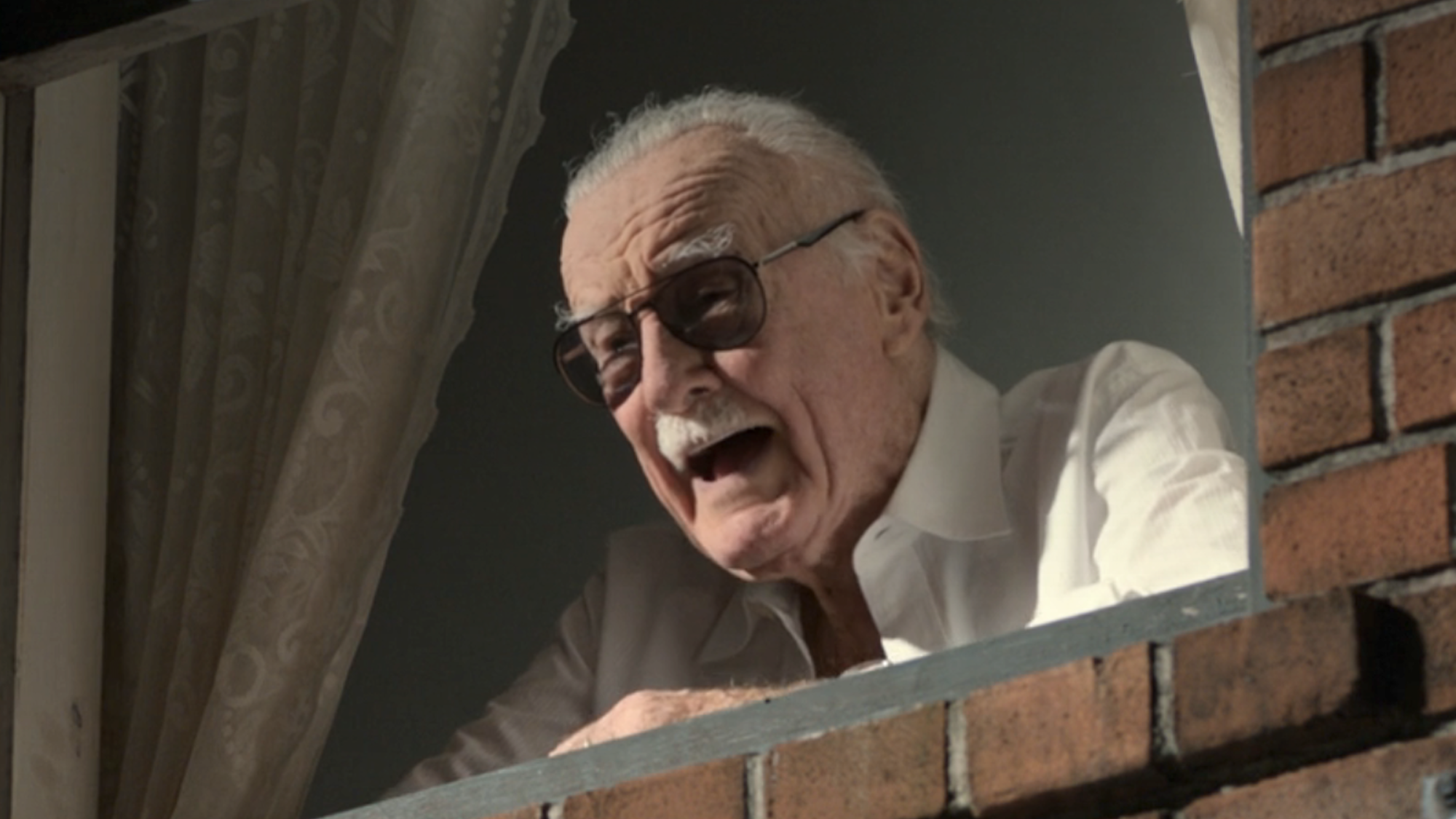 Stan Lee talking out a window in Spider-Man: Homecoming