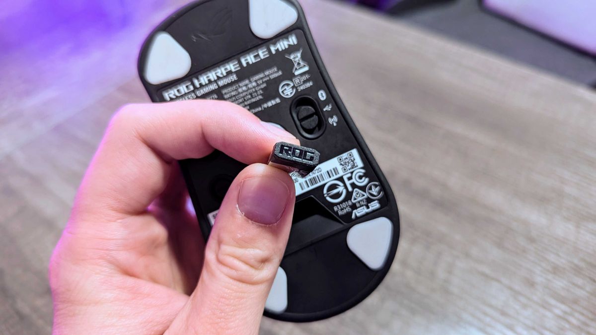 Image of the ASUS ROG Harpe Ace Mini wireless gaming mouse.