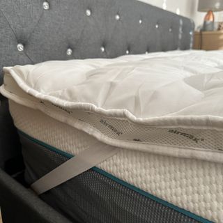 The Silentnight Airmax mattress topper on a mattress