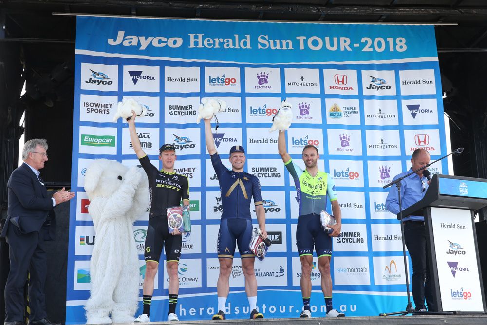 The stage 1 podium enjoy their moment