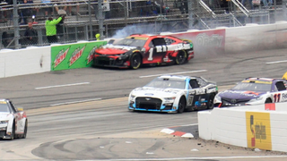 An image showing Ross Chastain "wall-riding" his way to 5th place on the Martinsville Speedway.