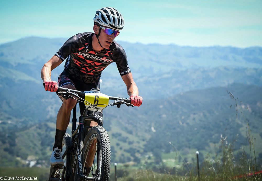Alex Wild (Specialized) climbing on the back side of the course