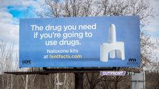 Billboard promoting anti-overdose drug