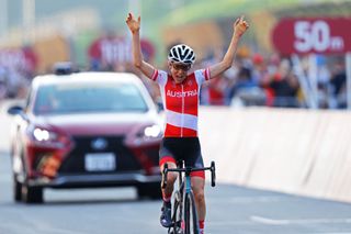Anna Kiesenhofer of Team Austria celebrates winning the gold medal on day two of the Tokyo 2020 Olympic Games