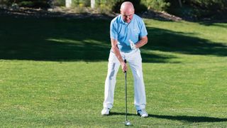 Keith Williams demonstrates how to set up to hit a mid iron