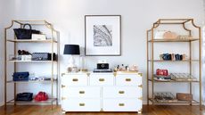 White dresser with shelving either side, bags and shoes arranged