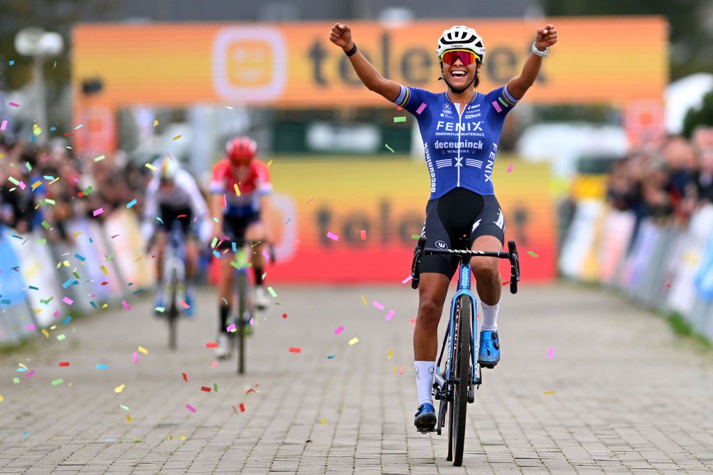 RUDDERVOORDE BELGIUM OCTOBER 20 Ceylin Del Carmen Alvarado of The Netherlands and Team FenixDeceuninck celebrates at finish line as race winner during the 37th Superprestige Ruddervoorde 2024 Womens Elite on October 20 2024 in Ruddervoorde Belgium Photo by Luc ClaessenGetty Images