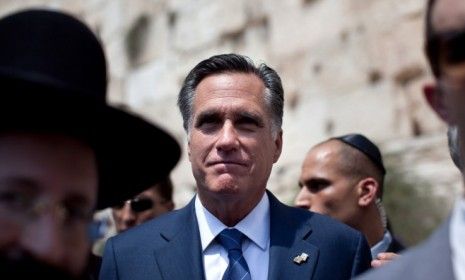 Mitt Romney visits the Western Wall in Jerusalem&amp;#039;s old city on July 29: The Republican&amp;#039;s Israel visit may have helped him lock up some Jewish votes in key battleground states.