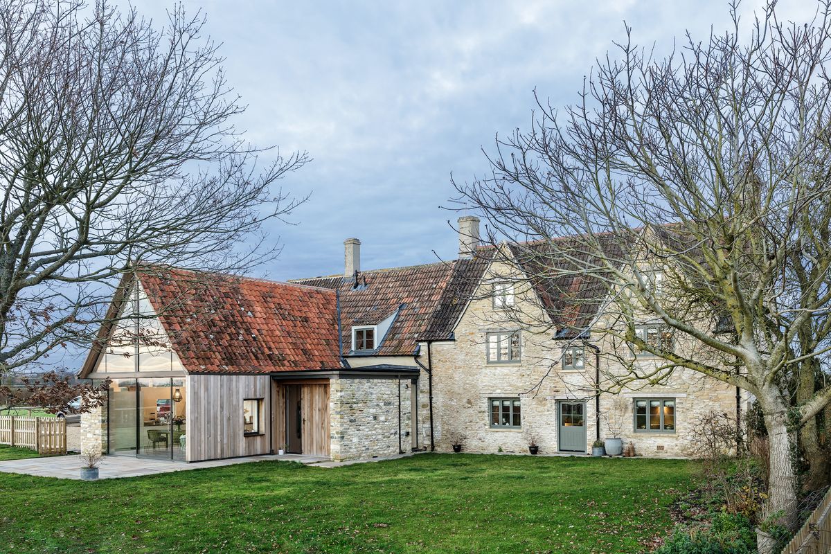 All house&rsquo;s the original windows were beyond repair and were replaced with bespoke hardwood versions, but the Roman pantiles on the main roof are originals, which were mirrored on the kitchen extension.