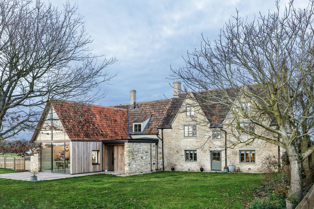 All house&rsquo;s the original windows were beyond repair and were replaced with bespoke hardwood versions, but the Roman pantiles on the main roof are originals, which were mirrored on the kitchen extension.