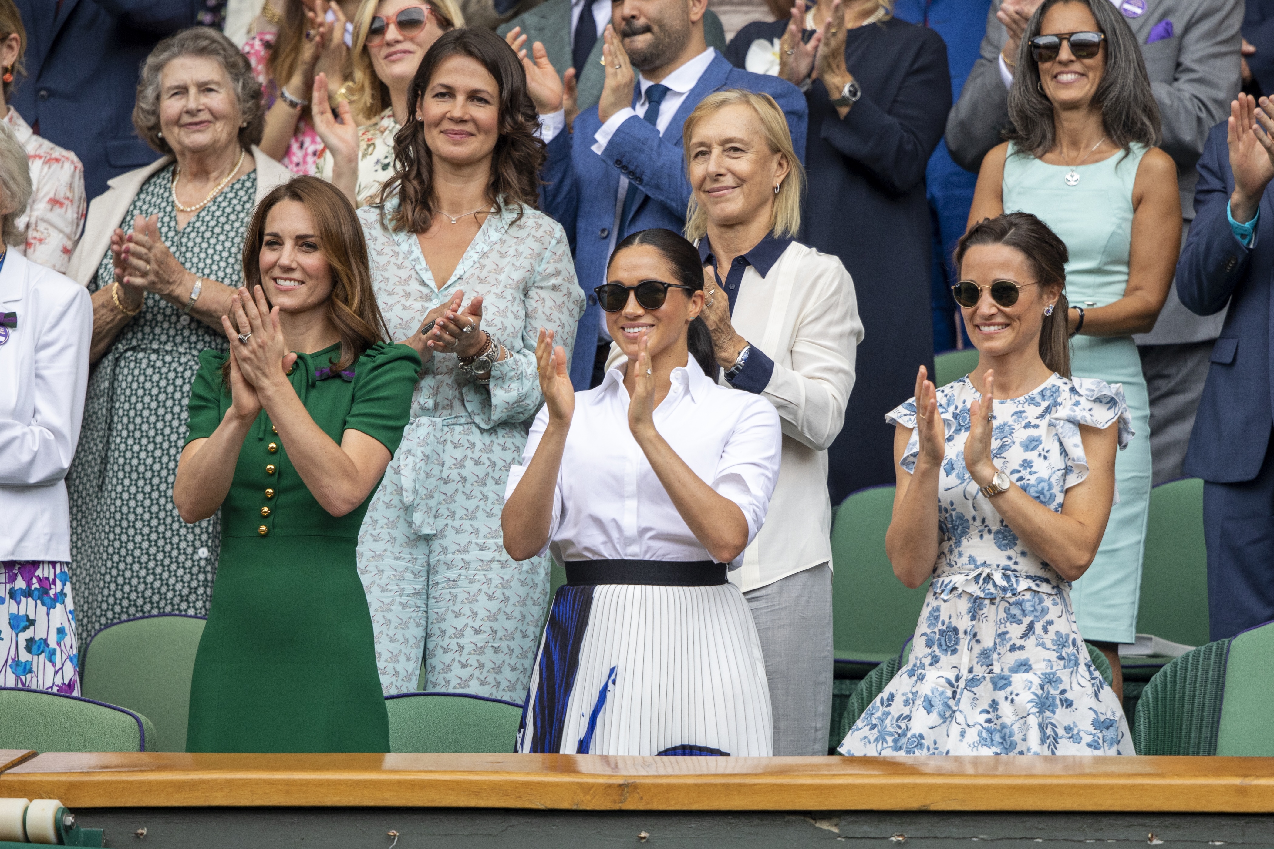 Meghan Markle, Kate Middleton and Pippa Middleton clapping at Wimbledon 2019