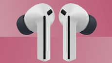 Samsung Galaxy Buds 3 FE on a red gradient background