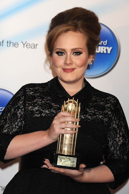 Adele, Adele 21 album, Adele singer, Adele beats Amy Winehouse, Adele biggest selling album of all time, Amy Winehouse 