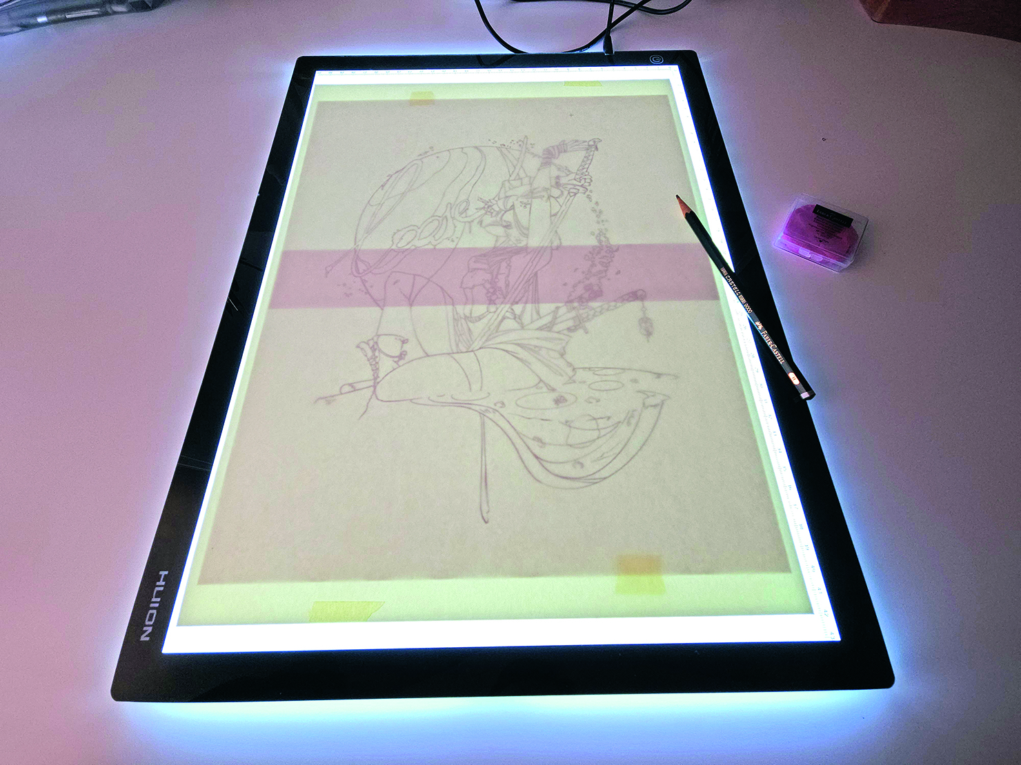 Watercolour geisha; a sketch on a light table
