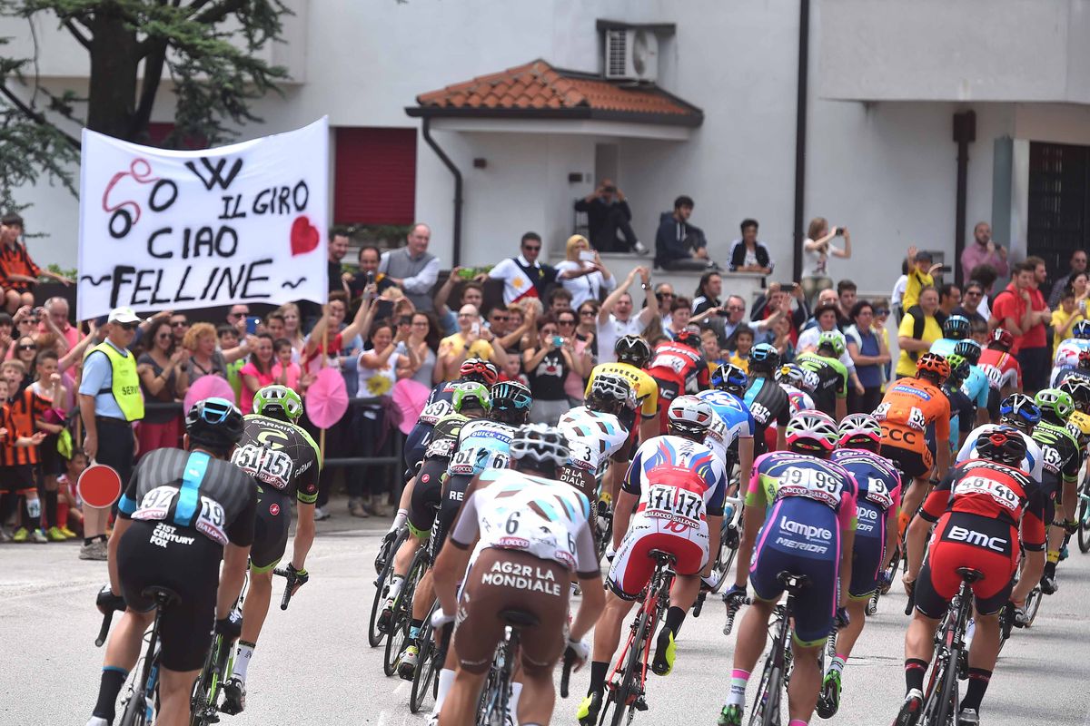 The fans cheer on the riders