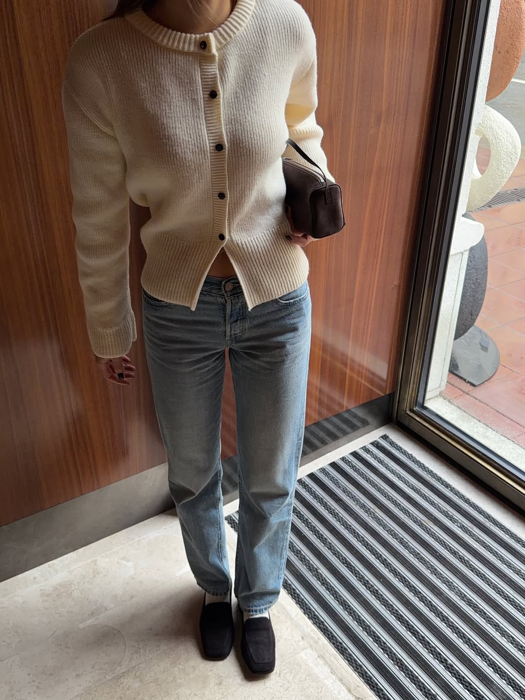 woman wearing winter sweater trend 2025