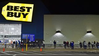 Shoppers wait outside of Best Buy for the opening of Black Friday shopping.