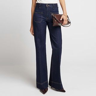 Wide-leg, high waisted jeans from River Island with front pockets