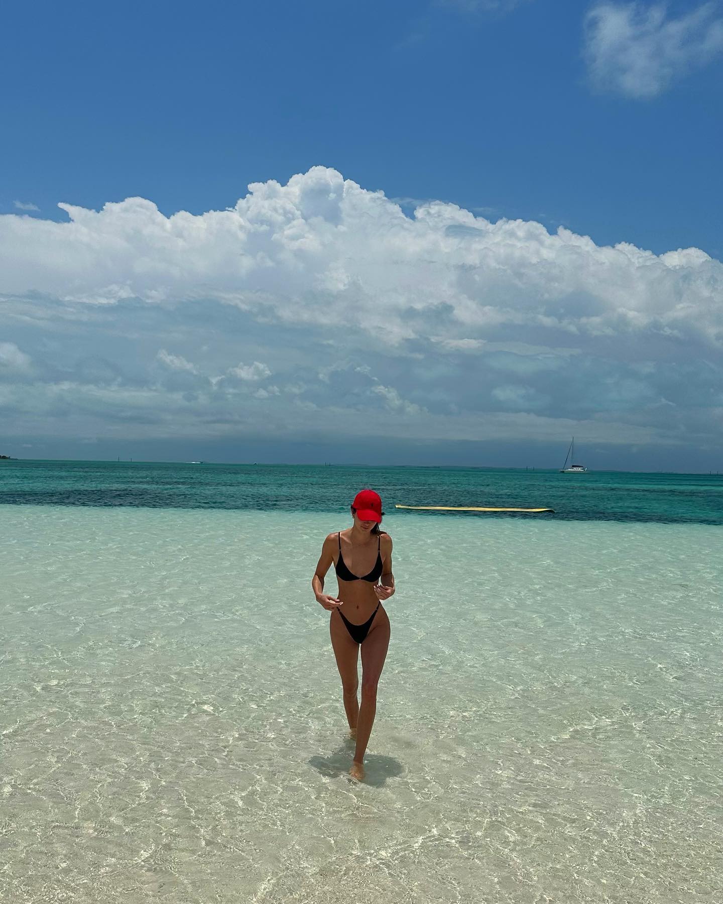An image of @kendalljenner wearing one of the best black bikinis.
