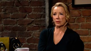 Melody Thomas Scott as a concerned Nikki in all black in The Young and the Restless