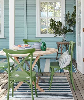 outdoor dining area with furniture painted with Little Greene