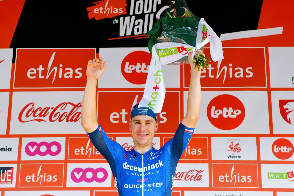 HEUSDENZOLDER BELGIUM JULY 21 Fabio Jakobsen of Netherlands and Team Deceuninck QuickStep stage winner celebrates at podium during the 42nd Tour de Wallonie 2021 Stage 2 a 120km stage from Zolder Circuit to Zolder Circuit Race held at the Zolder Circuit due to flooding in the country tourdewallonie grandprixdewallonie on July 21 2021 in HeusdenZolder Belgium Photo by Luc ClaessenGetty Images