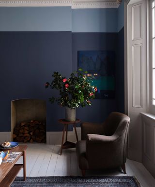 blue living room with gray armchairs