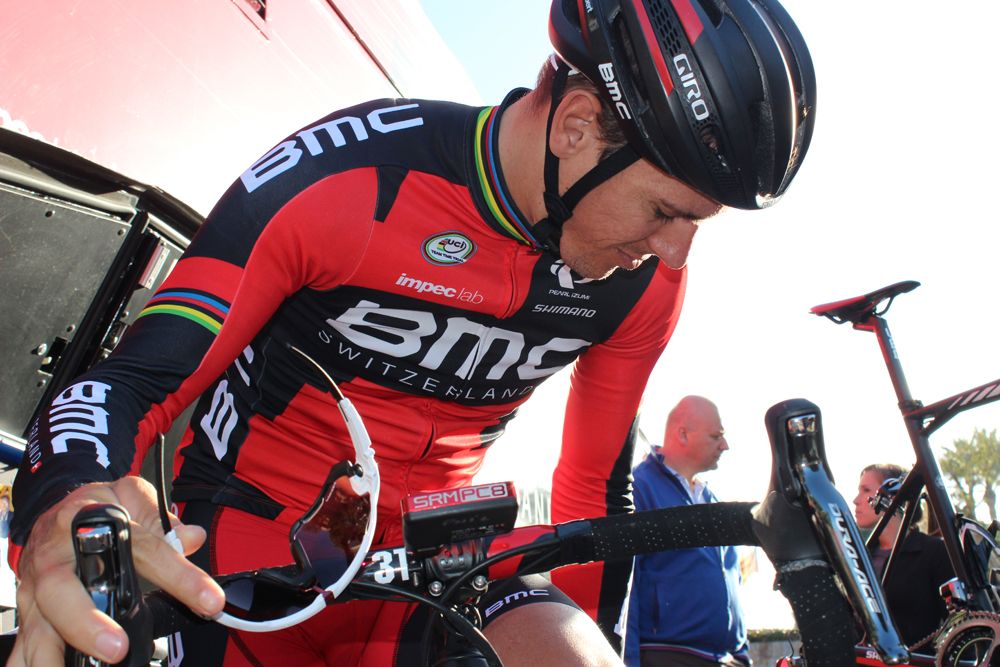Philippe Gilbert tweaks his bike before training ride