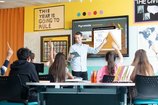 Male teacher in classroom using myViewBoard Software