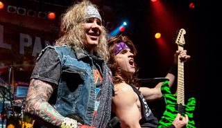 Michael Starr (left) and Satchel of Steel Panther perform at The Fillmore Detroit on December 2, 2018 in Detroit, Michigan
