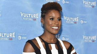 Issa Rae with high puff hairstyle