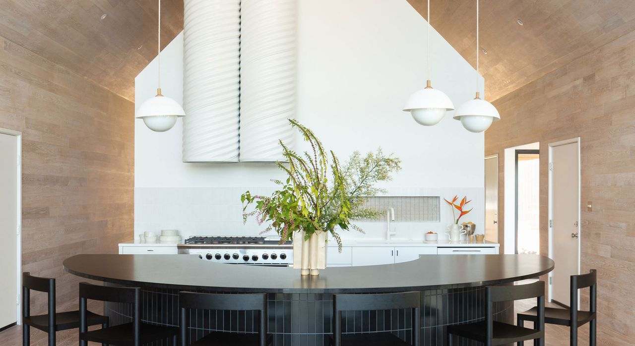 a modern home with a swirling pipe extractor hood