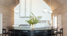 a modern home with a swirling pipe extractor hood