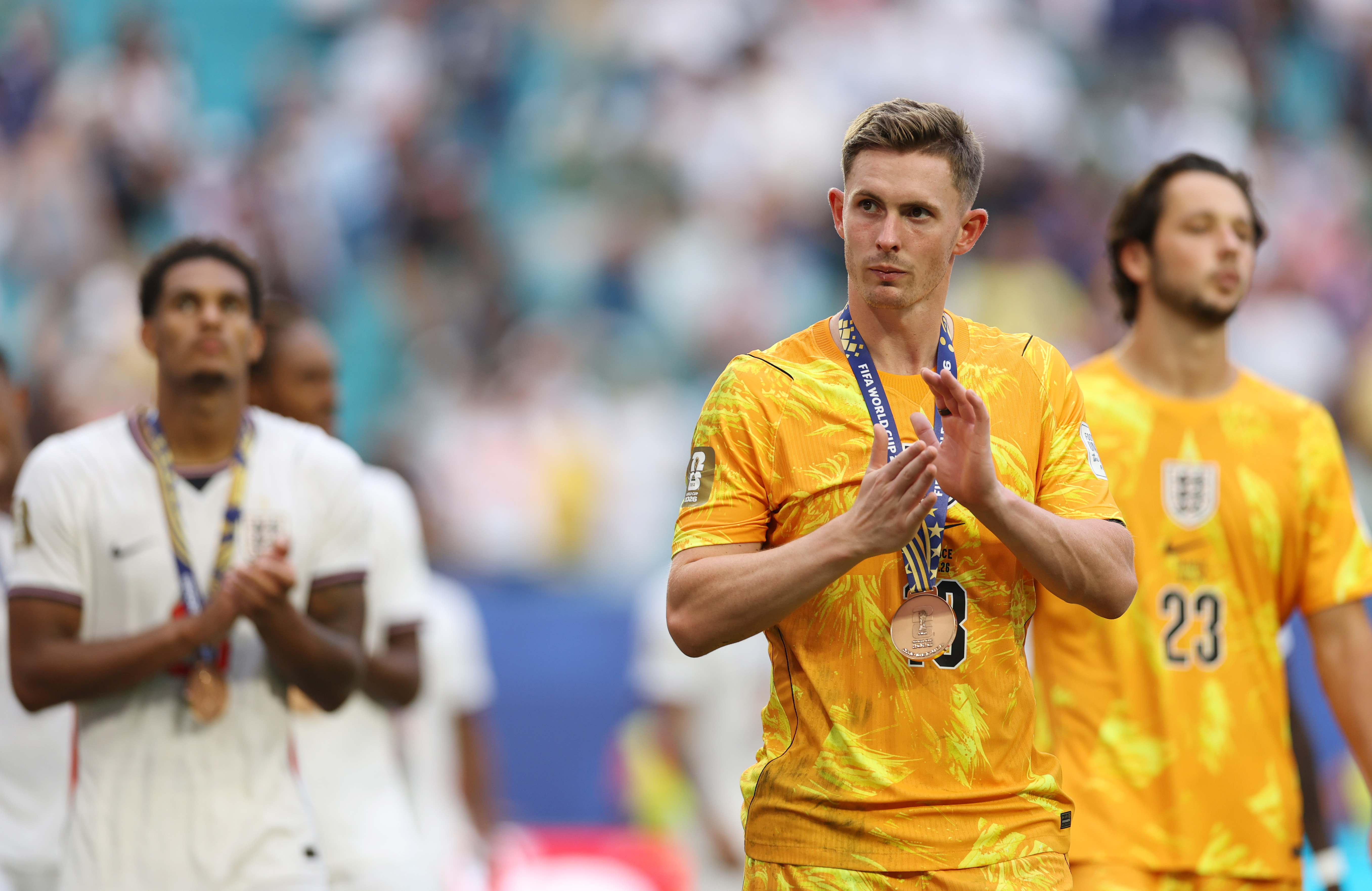 MIAMI GARDENS, FLORIDA - JULY 18: Dean Henderson #13 of England applauds the fans after receiving the third place medal after the 6-4 win during the FIFA World Cup 2026 Bronze Final between France and England at Miami Stadium on July 18, 2026 in Miami Gardens, Florida. (Photo by Buda Mendes/Getty Images)
