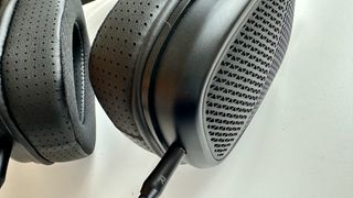 Shanling HW600 wired headphones' jack on a white surface