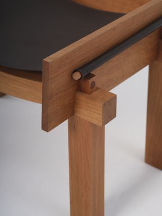 Detail of wooden and leather chair