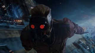 Star-Lord fying in space with mask