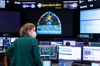 Fiona Turett, NASA's 100th flight director, is seen at her console during her first solo shift in the International Space Station control room at Johnson Space Center's Christopher C. Kraft. Jr. Mission Control Center in Houston, Texas, on Monday, Jan. 10, 2022.