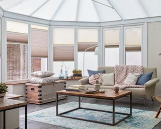 Conservatory with transition blinds by Hillarys