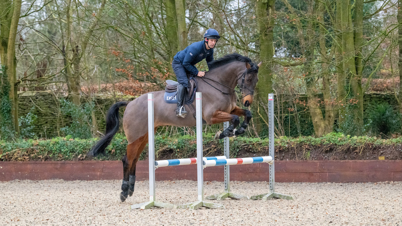 Harry Meade jumps a small parallel in training