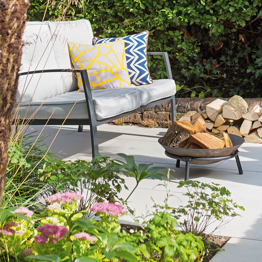 garden sofa beside fire pit
