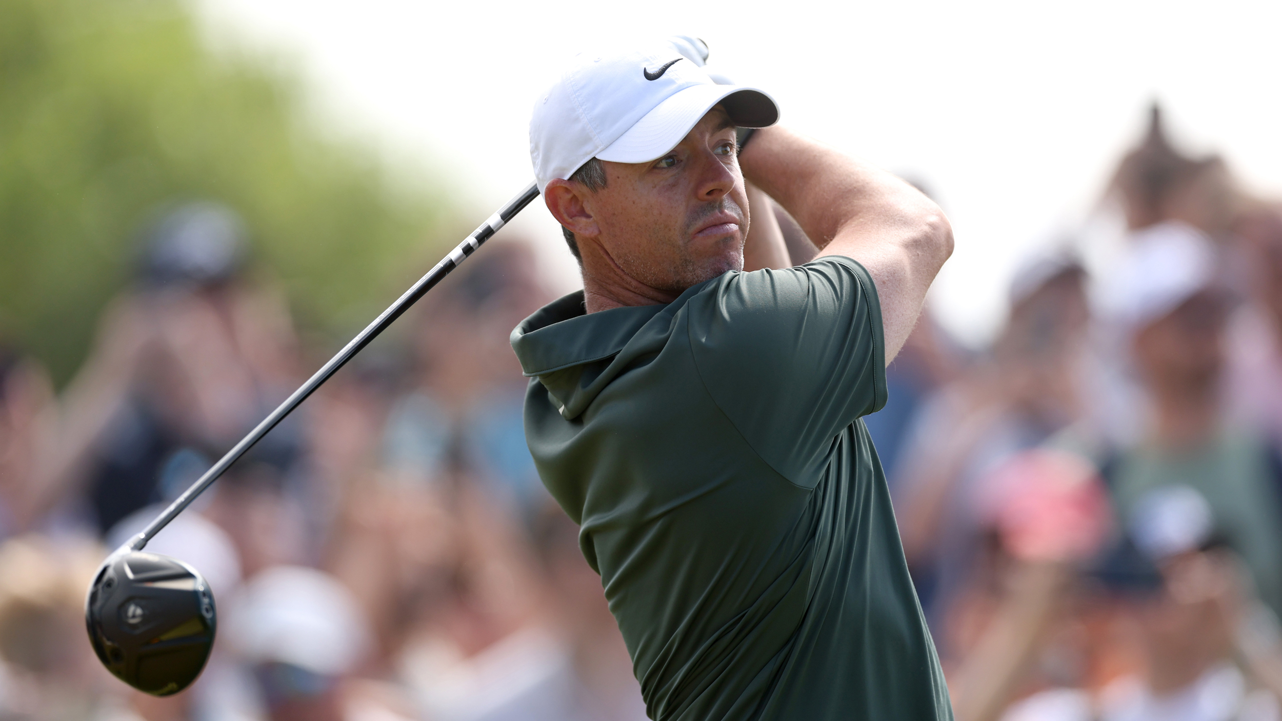 Rory McIlroy holds his finish on a drive