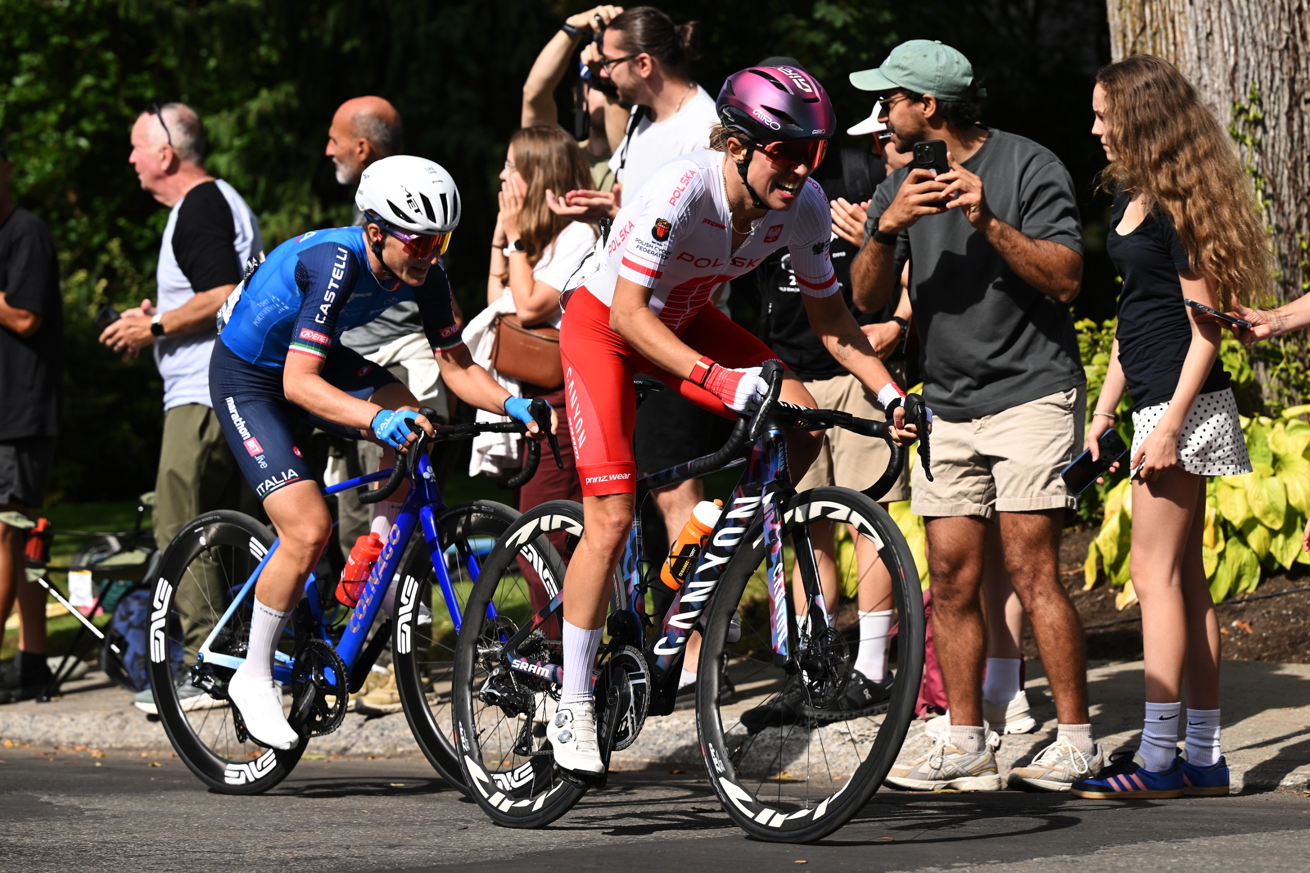 Elisa Longo Borghini and Team Italy and Kasia Niewiadoma-Phinney and Team Poland compete in the chase group during the 99th UCI Road World Championships Montreal 2026 - Women Elite Road Race a 180.1km one day race from Brossard to Montreal on September 26, 2026 in Montreal, Quebec. (Photo by Dario Belingheri/Getty Images)
