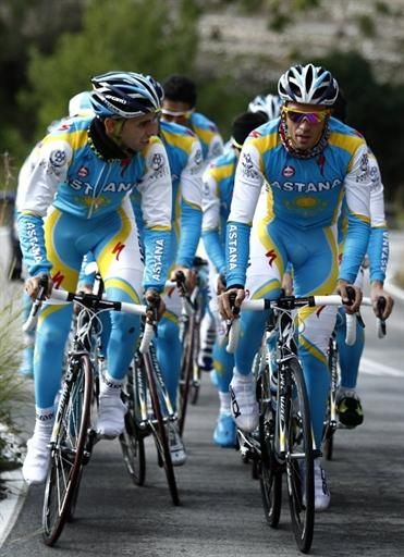 Alberto Contador chats with a teammate during a training ride in Calpe, Spain.