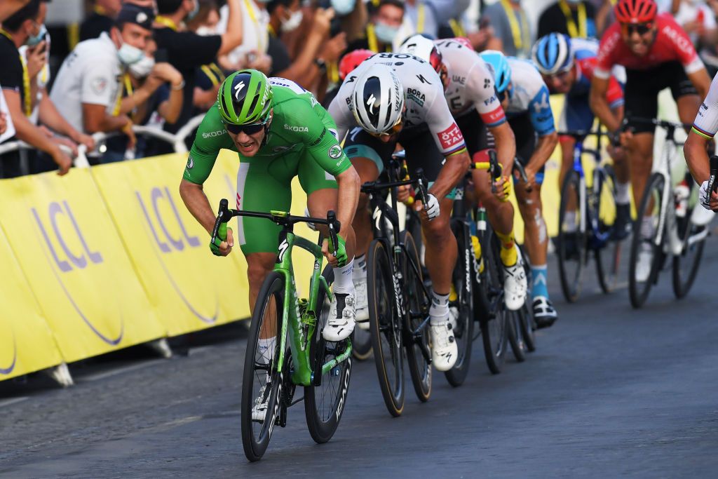 Sam Bennett opens up his sprint on the Champs Elysees in Paris