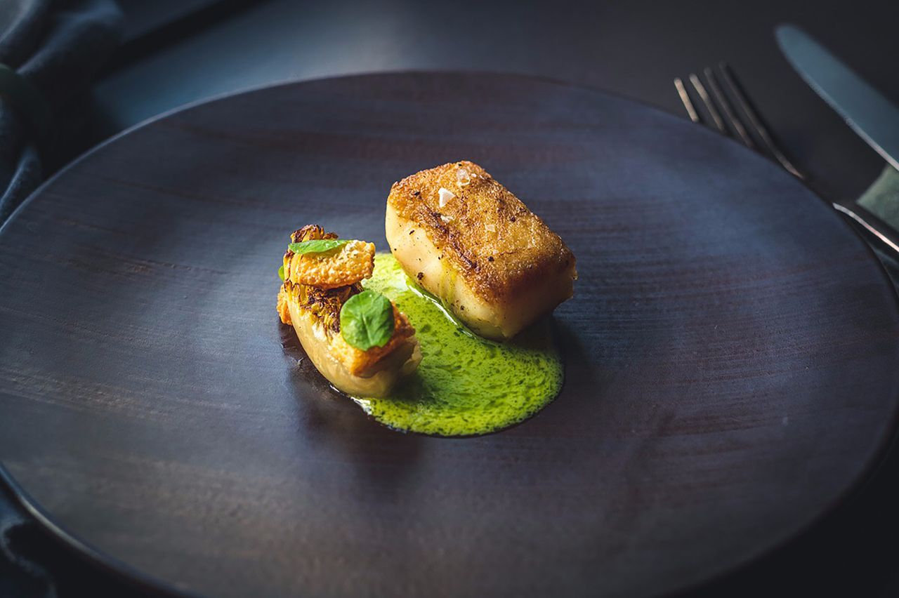 Halibut with pea veloute and baby gem lettuce